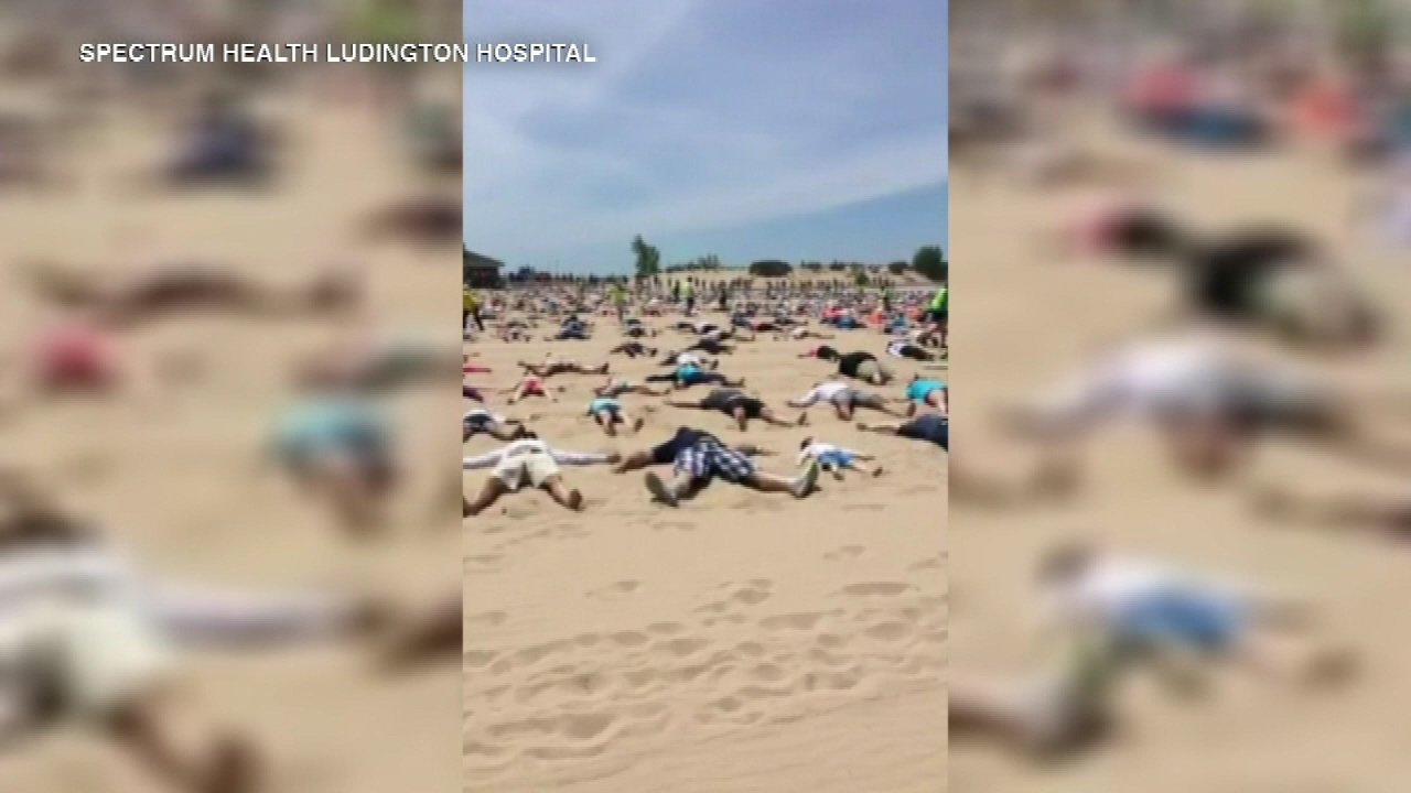 sand lake festival 2023 michigan Ludington, Michigan, breaks sand angel world record ABC7 Chicago